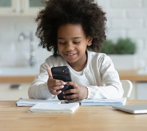 young boy with smartphone