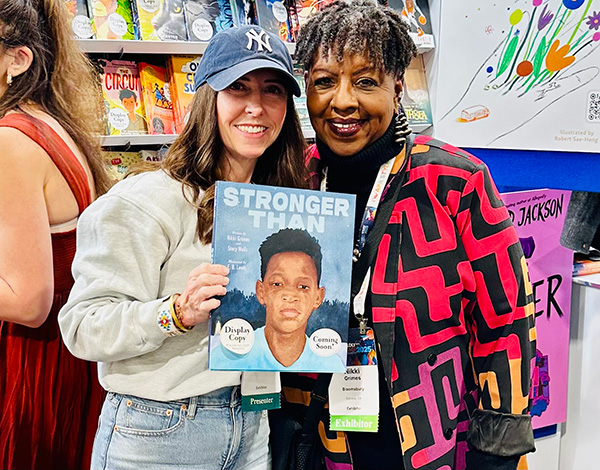Co-authors Stacy Wells and Nikki Grimes with their book Stronger Than